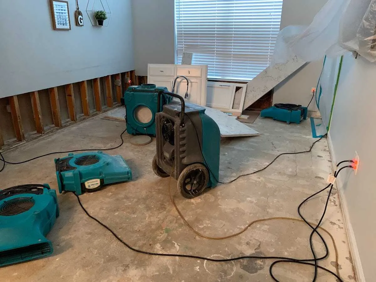 Dehumidifier in flood-cut room for Water Damage Restoration in Minnehaha